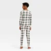 Kids' Plaid Ribbed Long Sleeve Shirt And Pants Holiday Matching Family Pajama Set - Wondershop™ Cream