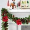 6' Cedar With Poinsettia Flowers And Pinecones Christmas Artificial Garland - Wondershop™: Traditional Decor, Indoor/Sheltered Outdoor Use